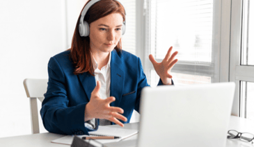 Women using headset and laptop 